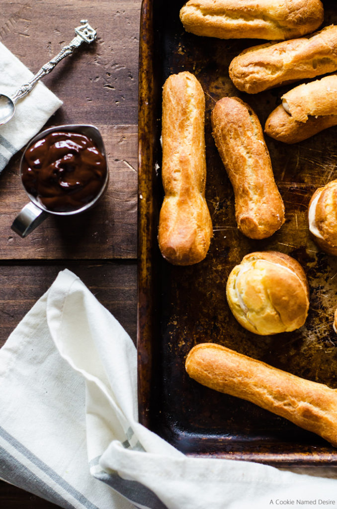 eclairs chocolate and baking sheet